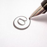 pen writing an arroba